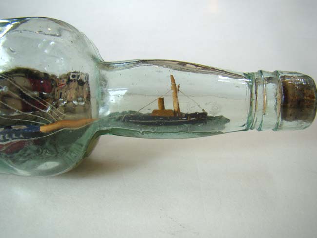 A Wonderful Antique Ship-in-a Bottle being lead into harbor by a pilot boat circa 1900 — image 3